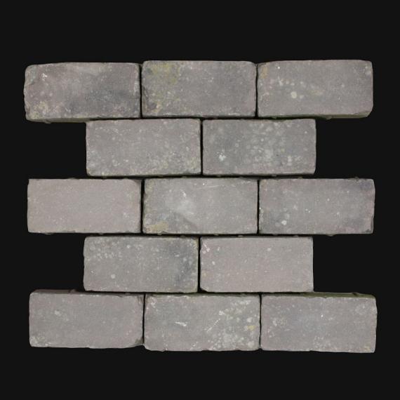Oude gebakken keiformaten Mangaan (op pallets)