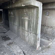 Keerwand gebruikt 155x100x115 Grijs, hoogte x lengte x voet in cm.