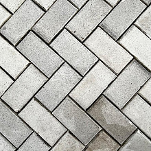 Oude gebakken keiformaten wit markeringssteen (op pallets)
